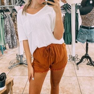 Frayed bottom shorts- clay/orange